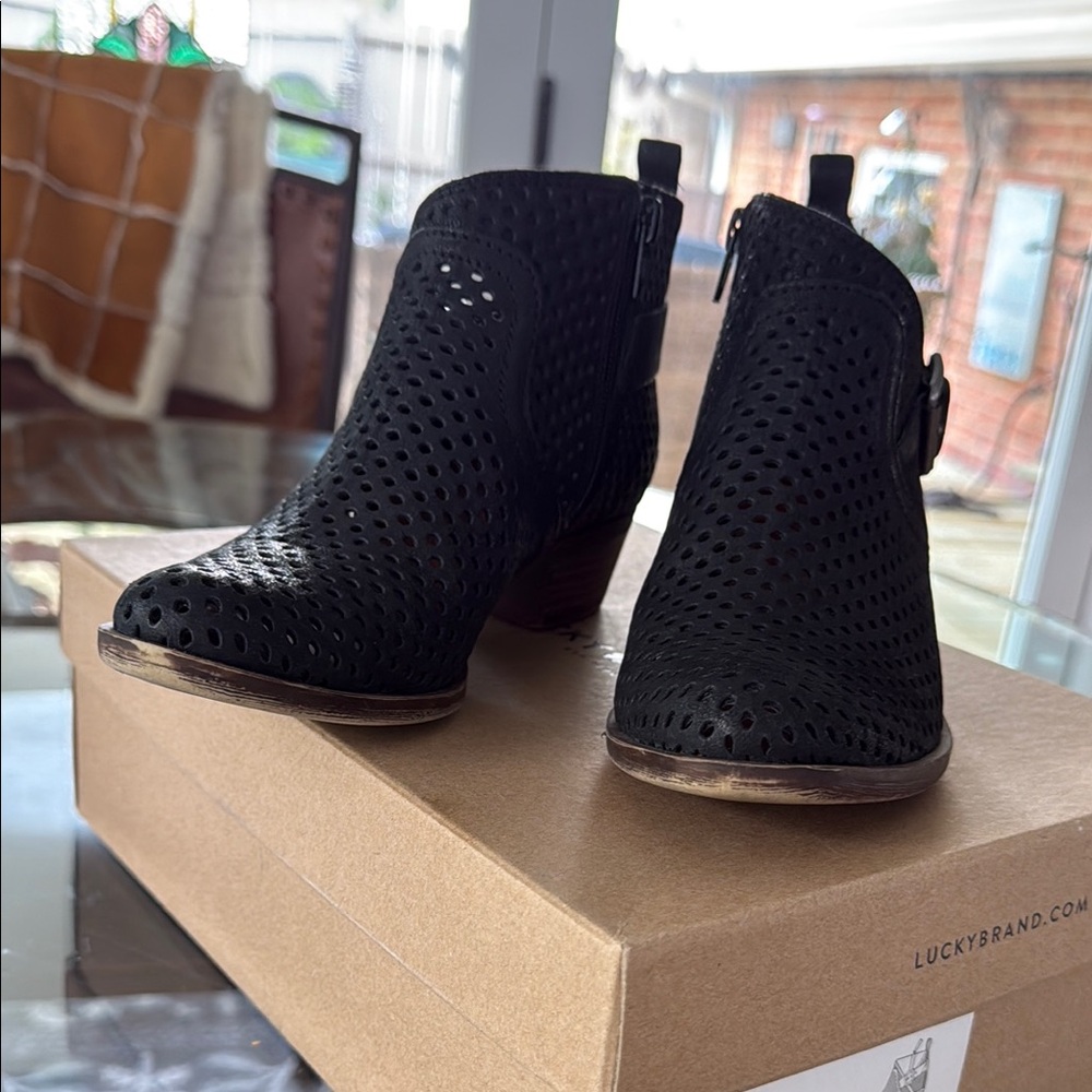 Lucky Brand Beautiful Black perforated Ankle Boots size 6. New with box.